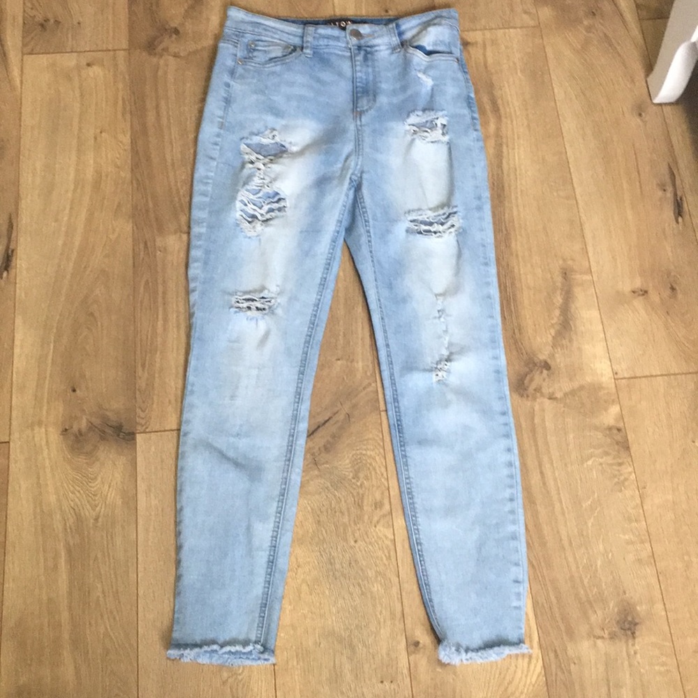 High wasted light washed pants with rips